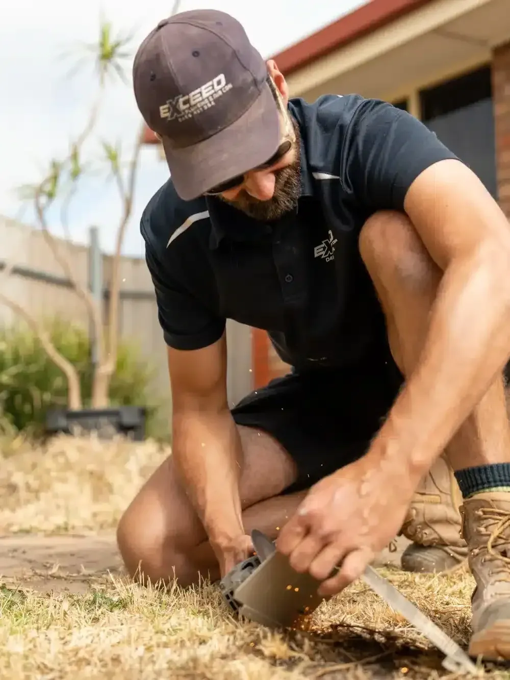 A Kilburn plumber at work on a job